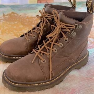 Dr. Martens brown, brushed leather combat boots.